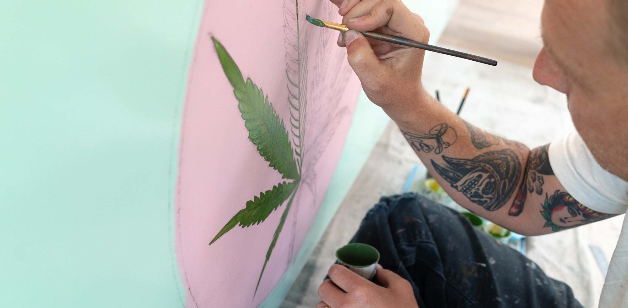 Man painting graphic