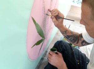 Man painting graphic